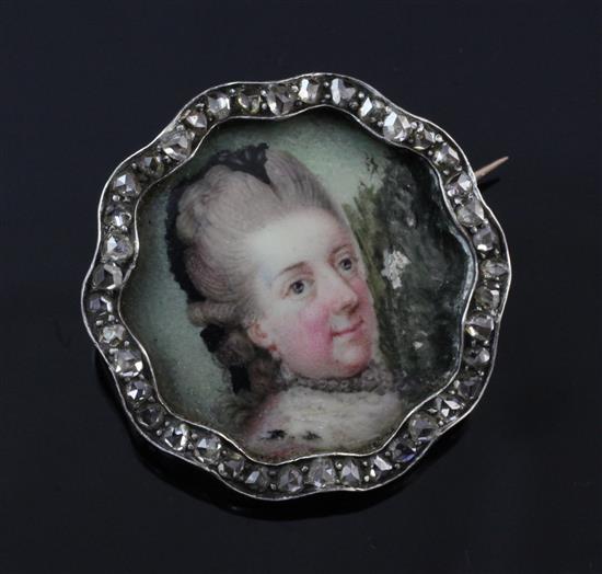 A gold, silver and rose cut diamond set portrait brooch, 1in.